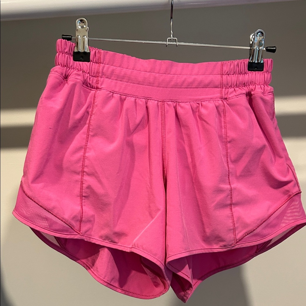 Lululemon Hotty Hot Lined 4 inch shorts. Size 4. Hot pink. Good condition.